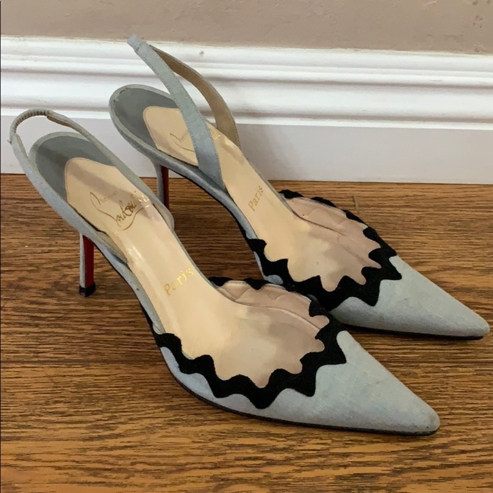 **Sold** Christian Louboutin heels in gray